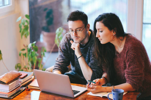 istock People working late in the apartment 691228402