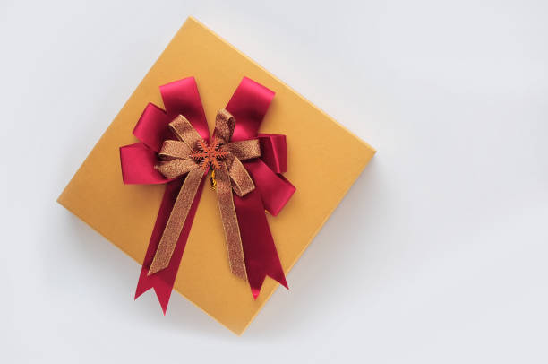 istock Gift box with red ribbon on white background 691228606