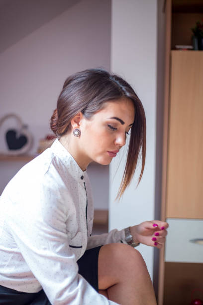 istock Woman using laptop at home 691228924