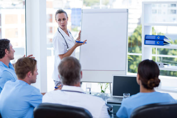 istock Team of doctors having brainstorming session 691229218