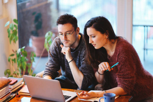 istock People working late in the apartment 691232110