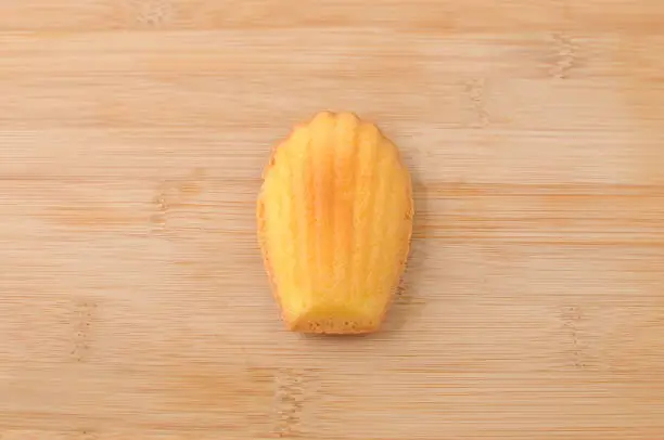 madeleine french pastry isolated on cutting board