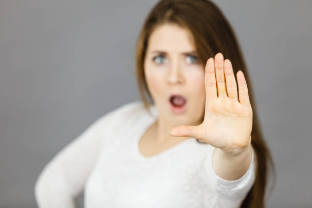 istock Angry apodicticity woman showing stop with hand 691245114