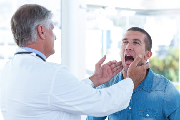 istock Doctor examining his patients ganglion 691262136