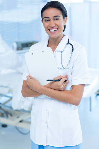 istock Beautiful smiling doctor smiling at camera 691263328
