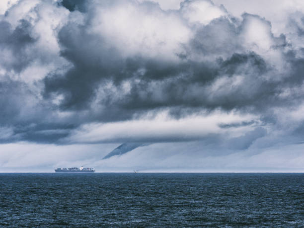 istock Container Ship Traveling Along Canadian Coast 691275866