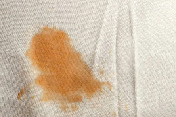 Photo of Tomato stain on white cloth