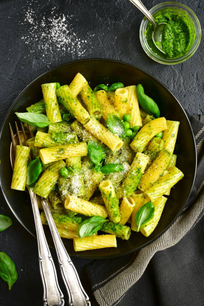istock Pasta with sauce pesto and green pea 691293778