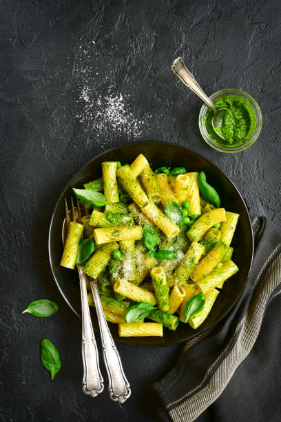 istock Pasta with sauce pesto and green pea 691293924