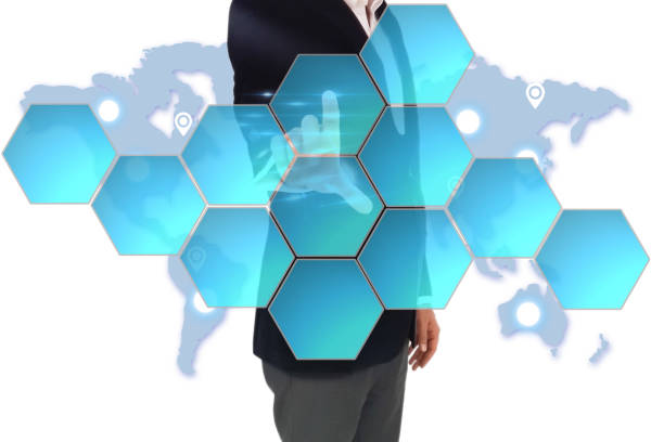 istock businessman in dark gray suit making decision in business by pushing on one hexagonal button. Businessman hand pushing digital screen 691297154