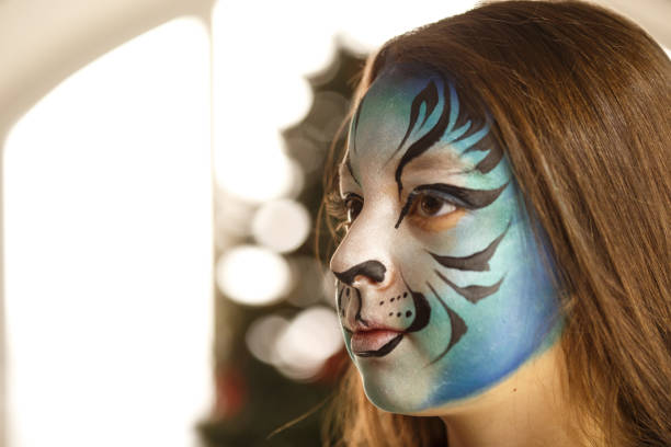istock Girl with painted face 691315770