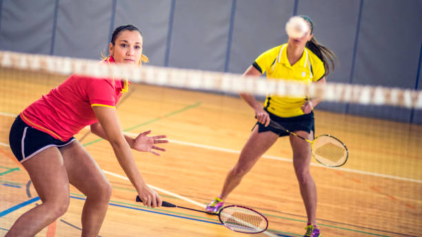 istock Female badminton player about to hit the shuttlecock 691333310