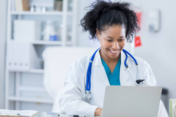 istock Confident female doctor works in her office 691334474