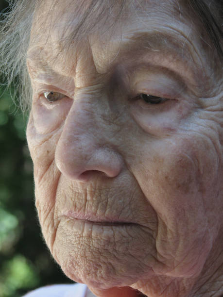istock Elderly woman in serious thought 691338690