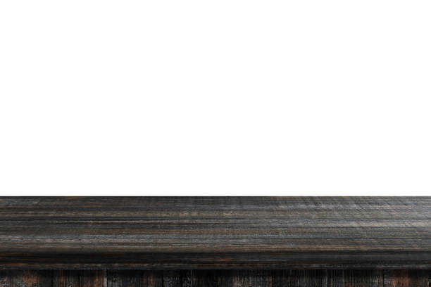 istock Empty dark vintage wooden table isolated on white background, for product display montage 691346490