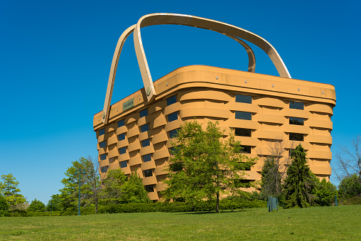 NEWARK, OH - MAY 15, 2017: The worldâs largest picnic basket was once the headquarters of the Longaberger Company. It stands 7 stories tall and is twice as long as a football field at the top. It has been empty since 2016.
