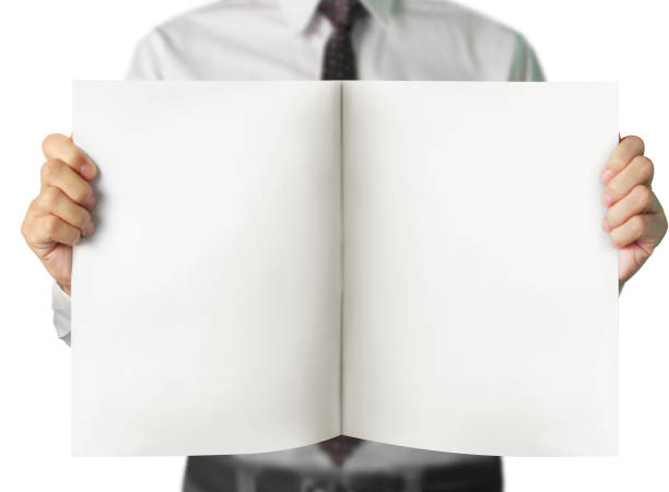 istock blank sheet of paper in hand 691347068