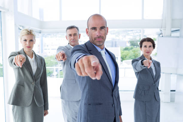 istock Business team pointing at the camera 691350212
