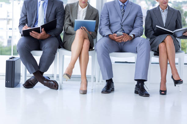 istock Business people waiting to be called into interview 691350560