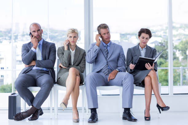istock Business people waiting to be called into interview 691350654