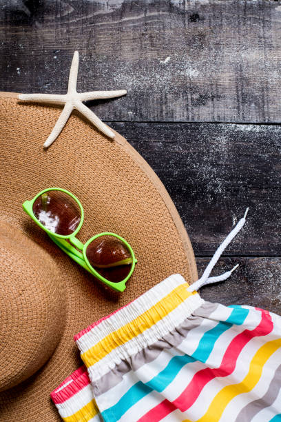 istock summer decoration on wood background, flat lay photo 691360934
