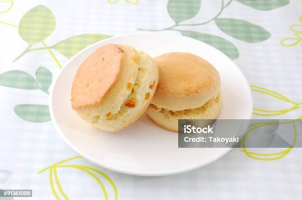 Plain Scone Biscuit Isolated On A Plate On Table Stock Photo - Download Image Now - Baked, Bakery, Bread