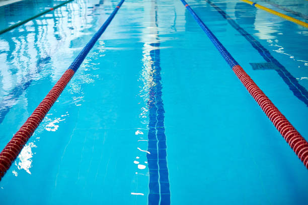 Empty swimming pool Swimming pool lane rope separated place for swimmer competition group stock pictures, royalty-free photos & images