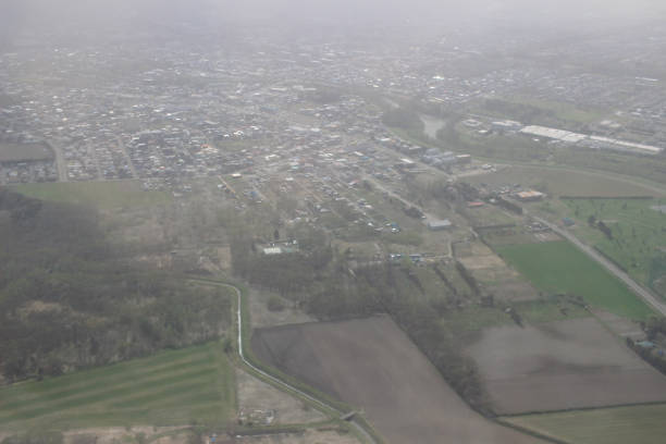 istock View of the land, fields, and clouds from above 691373568
