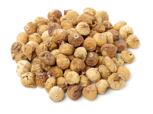 istock Dried figs with one chopped in half isolated on white 691373678