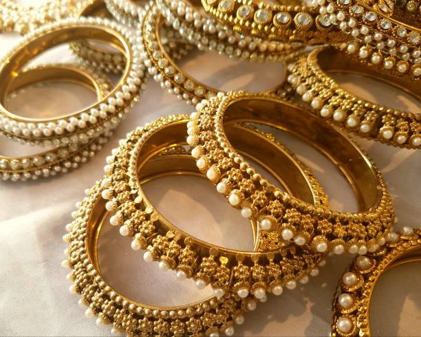 Jewellery Indian traditional Jewellery Indian traditional gold bangles pics stock pictures, royalty-free photos & images