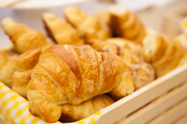 istock Fresh baked croissants. soft focus 691380722
