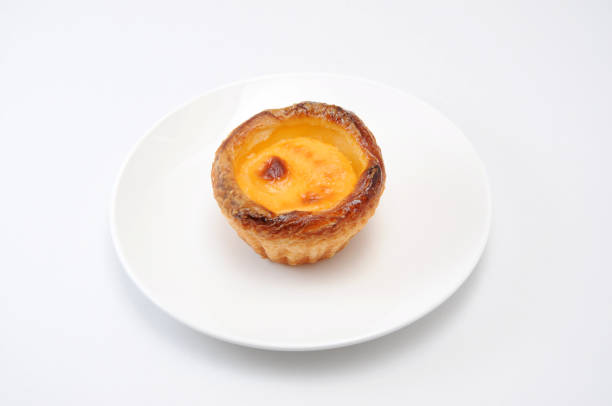 istock egg tart cheese pie on a plate on white background 691384024
