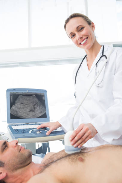 istock Doctor using ultrasound scan on male patient 691388374