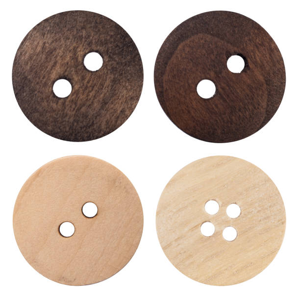 istock Wooden buttons isolated on white background. 691392188