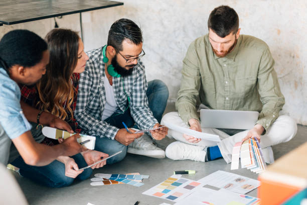 istock Coworkers collaborating in the office 691392718