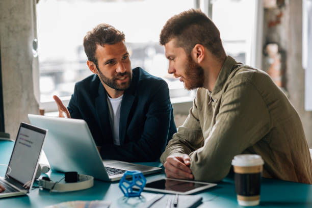 istock Coworkers collaborating in the office 691395862