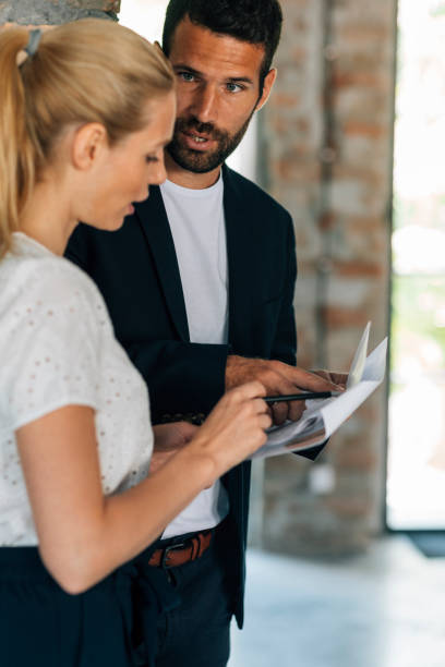 istock Coworkers collaborating in the office 691398550