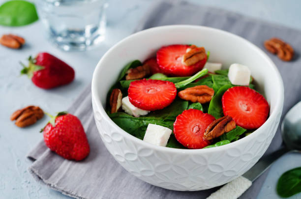 istock Strawberry spinach goat cheese pecan salad 691399254
