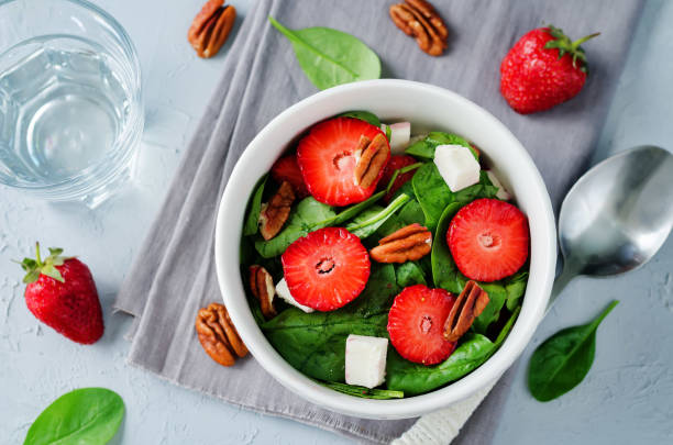 istock Strawberry spinach goat cheese pecan salad 691399302