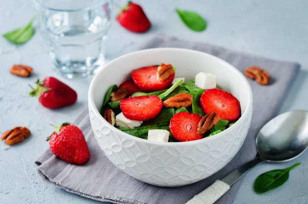 istock Strawberry spinach goat cheese pecan salad 691399314