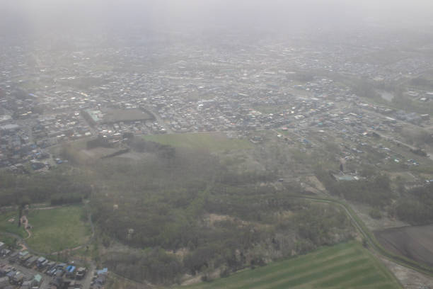 istock View of the land, fields, and clouds from above 691403564