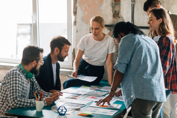 istock Coworkers on meeting in an open space office 691406658