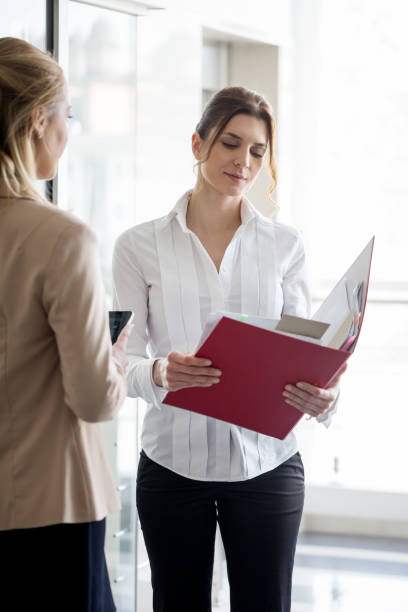 istock Businesswomen working in office 691417366