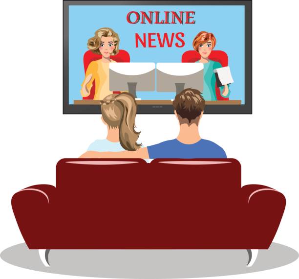 istock Couple sitting on the couch and watching TV 691418682