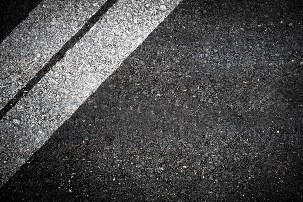 istock Close up old top view of asphalt road 691418892