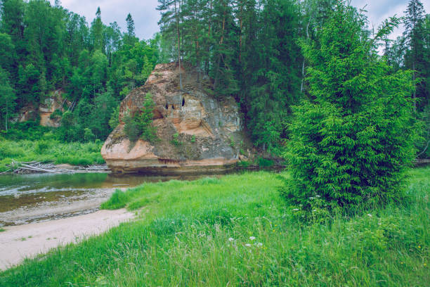 istock River Amata with Zvartas cliffs in Latvia. 691419378