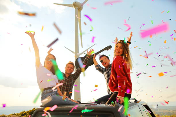 istock While young people are having fun with colorful papers 691422588