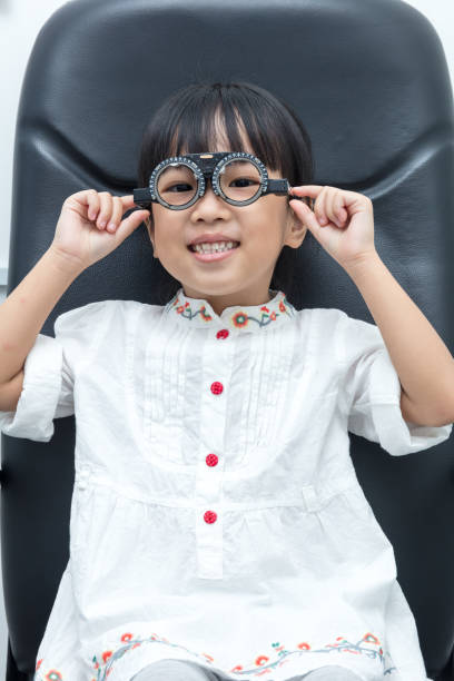 istock Asian Little Chinese Girl Doing Eyes Examination 691423728