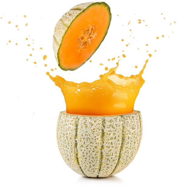 juice spilling out of a cantaloupe melon stock photo