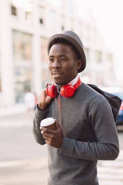 istock African american man walking in city 691429840